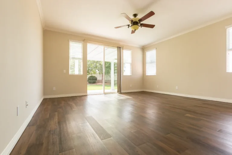 A room of the house with finished wood floors.